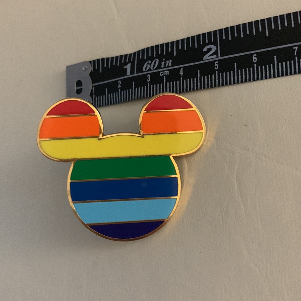 DISNEY Gold tone Rainbow Mickey Mouse logo pin w/ black Mickey pin holder. 2008 - Picture 2 of 8